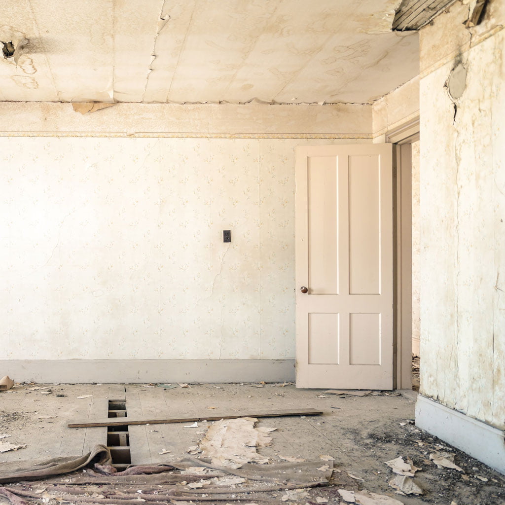 Photo of a decaying stucco wall