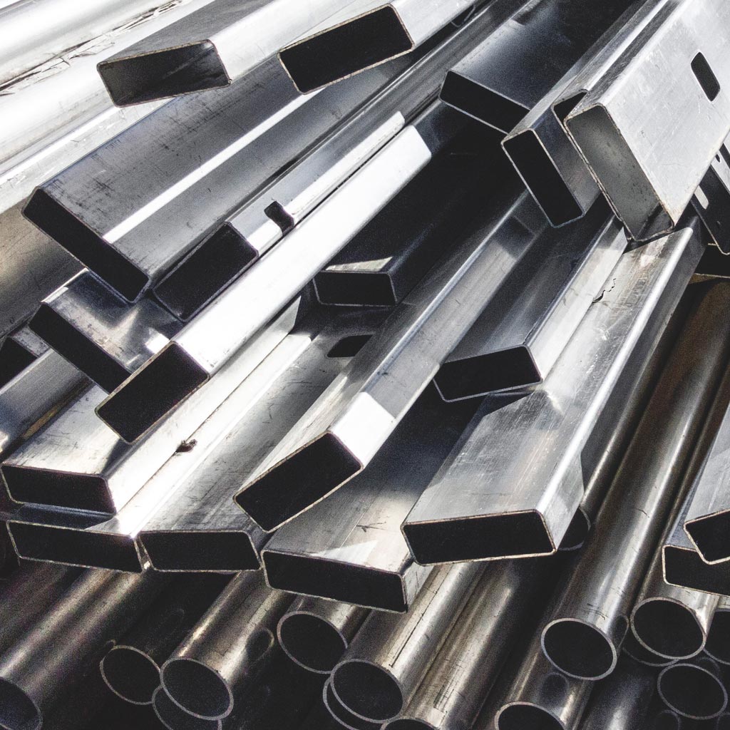 A close up photo of several varieties of steel used in construction
